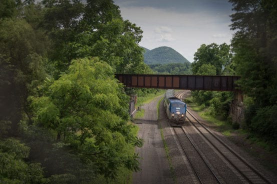 Amtrak passes under the Beacon Line bridge