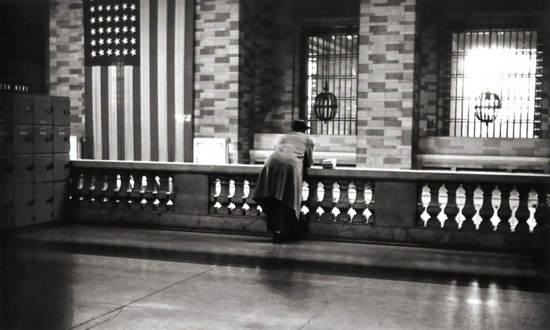 1/1954 - A man waits on the balcony at Grand Central